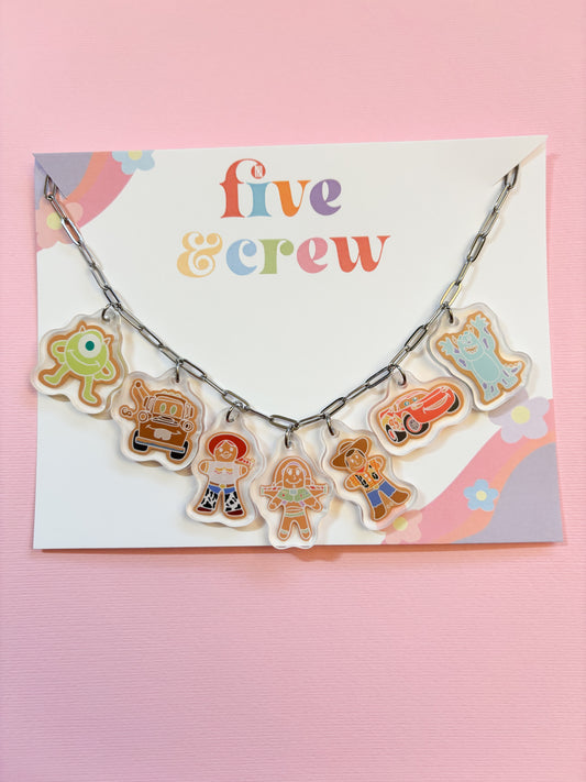 Pixar Gingerbread Charm Necklace And Bracelet